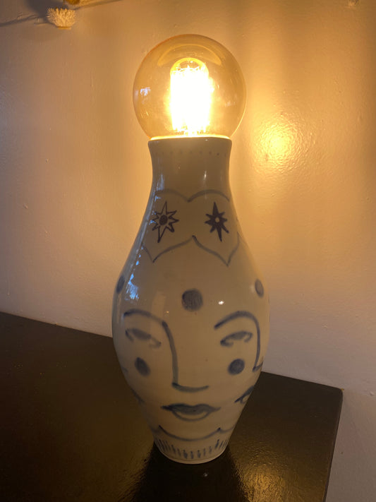 Faces table lamp